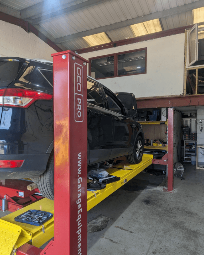 Mechanic working on a car